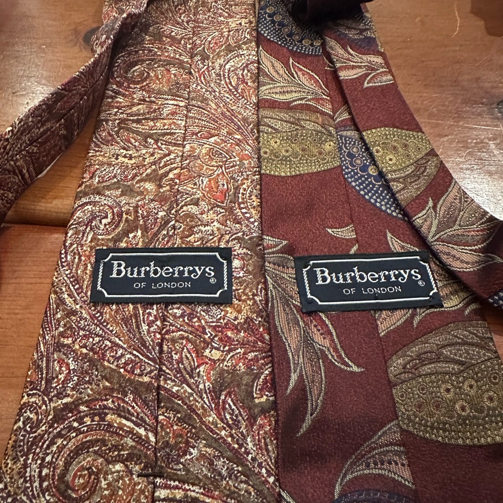 TWO (2) BURBERRYS OF LONDON 1005 SILK NECKTIEs FLORAL TAPESTRY and PAISLEY